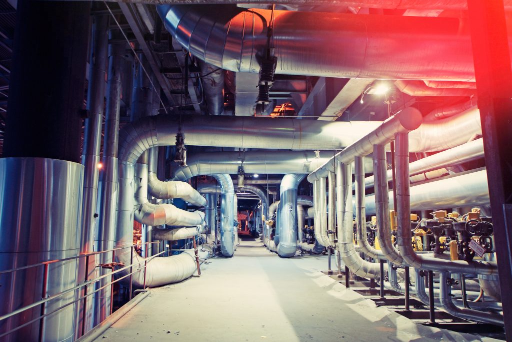 Industrial Interior with Pipes and Walkway